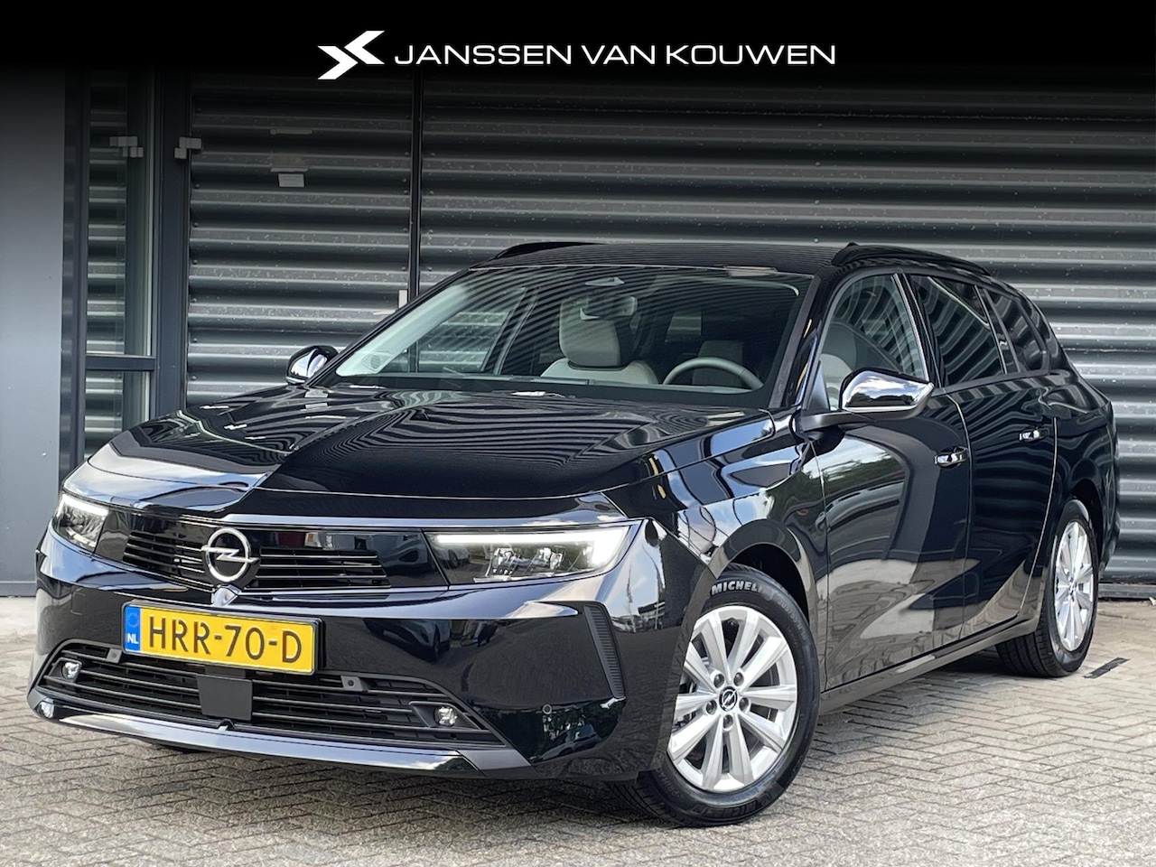 Opel Astra Sports Tourer - 1.2 Turbo Business Edition Achteruitrijcamera Apple CarPlay Keyless - AutoWereld.nl