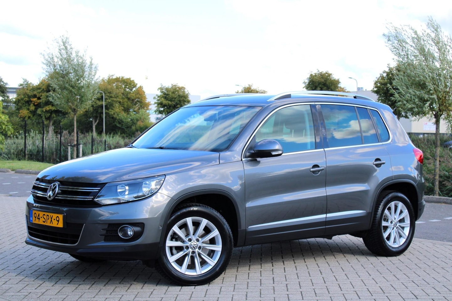 Volkswagen Tiguan - 1.4 TSI l Climate l PDC l Navi l Trekh - AutoWereld.nl