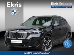 BMW iX1 - eDrive20 M Sportpakket Pro | Travel Pack | 19 inch LM M Dubbelspaak (Styling 871 M) | Trek