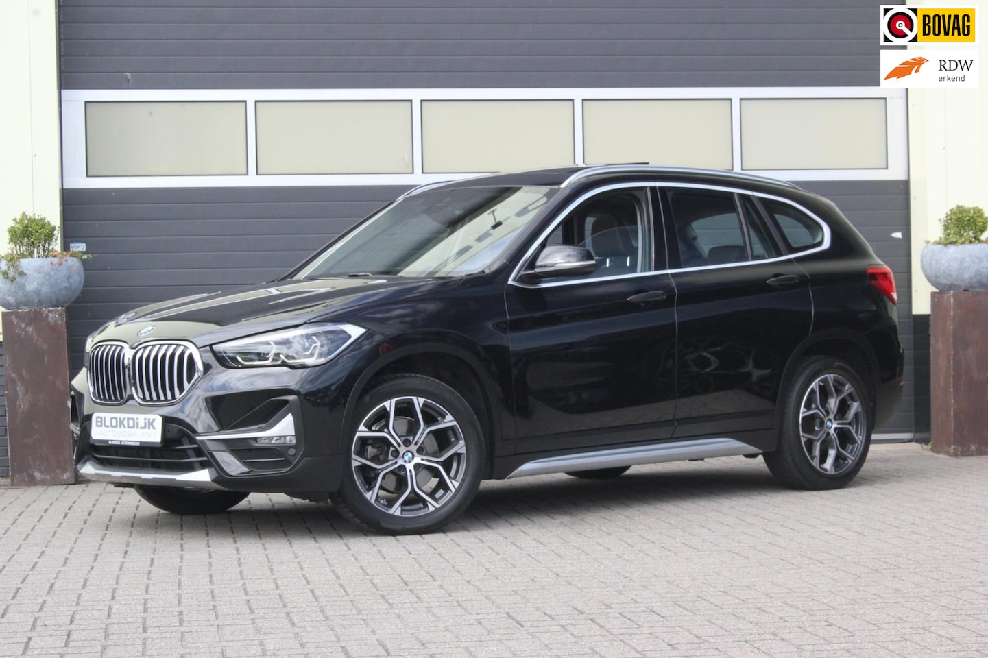 BMW X1 - 1.8i sDrive xLine | Trekhaak | Panoramadak | - AutoWereld.nl