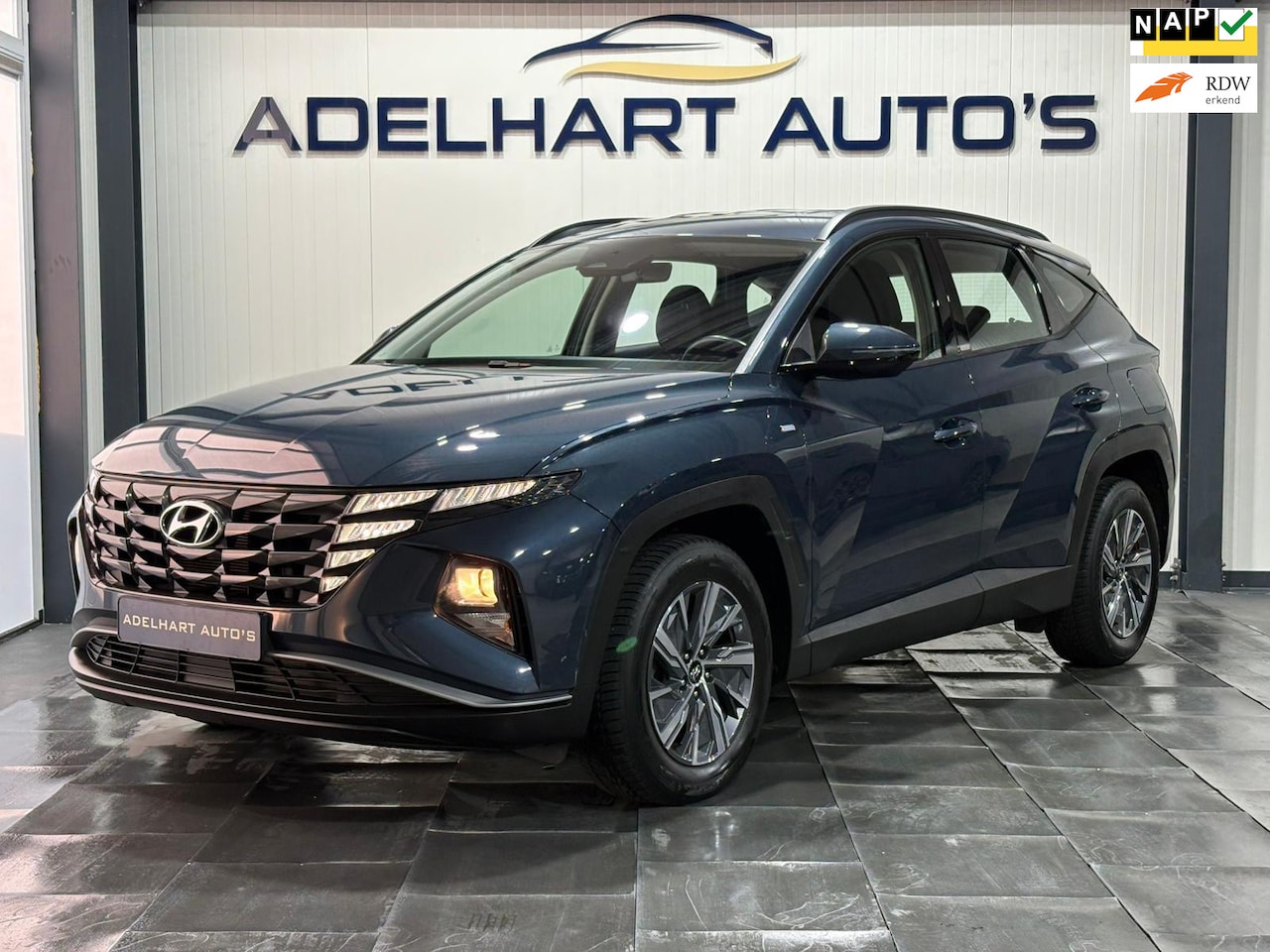Hyundai Tucson - 1.6 T-GDI MHEV Comfort Automaat / Navigatie full map / Camera / Cruise control / Climate c - AutoWereld.nl
