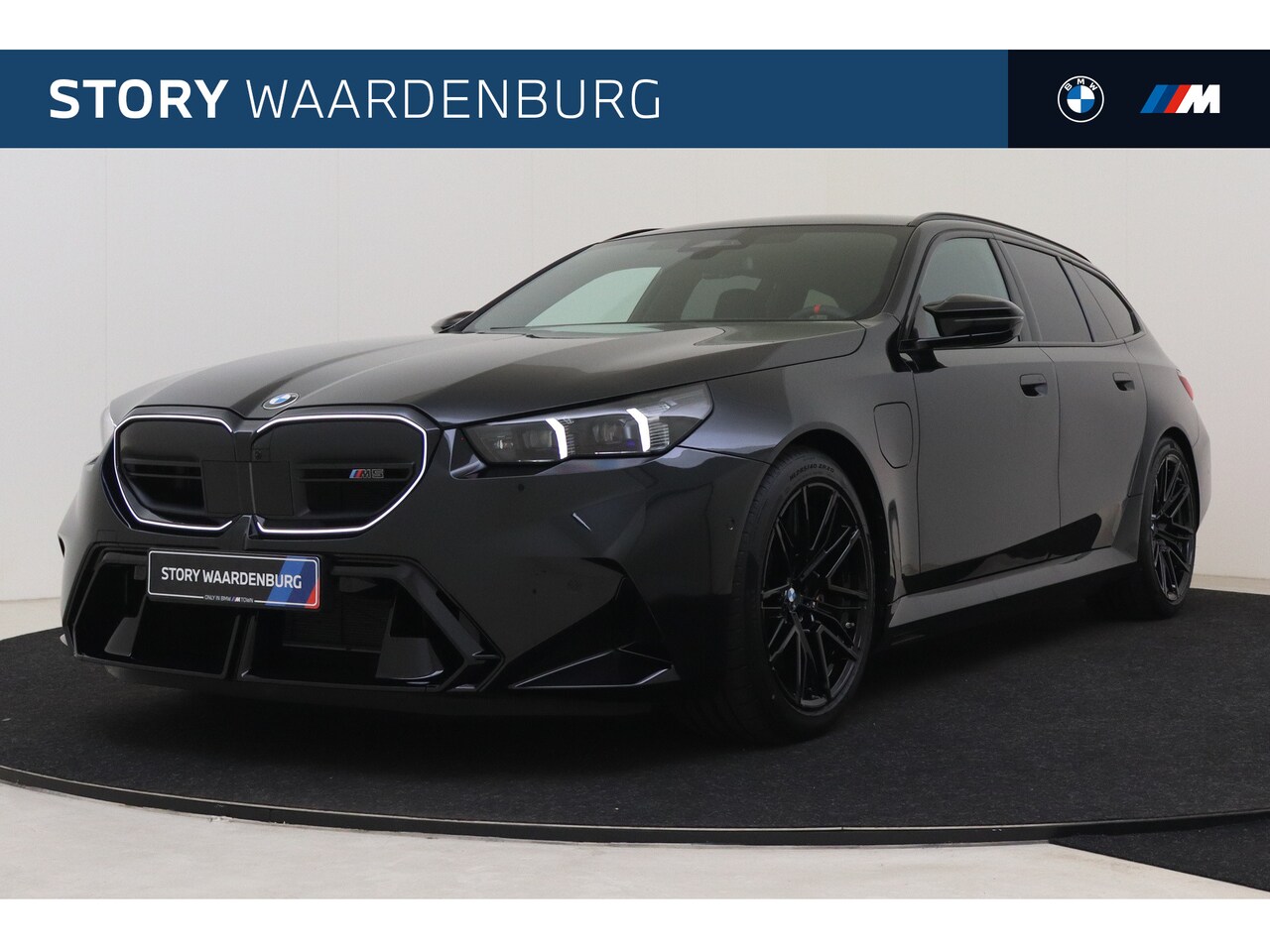 BMW 5-serie Touring - M5 Automaat / M Drive Professional / Trekhaak / M Carbon-keramische remmen / Bowers & Wilk - AutoWereld.nl