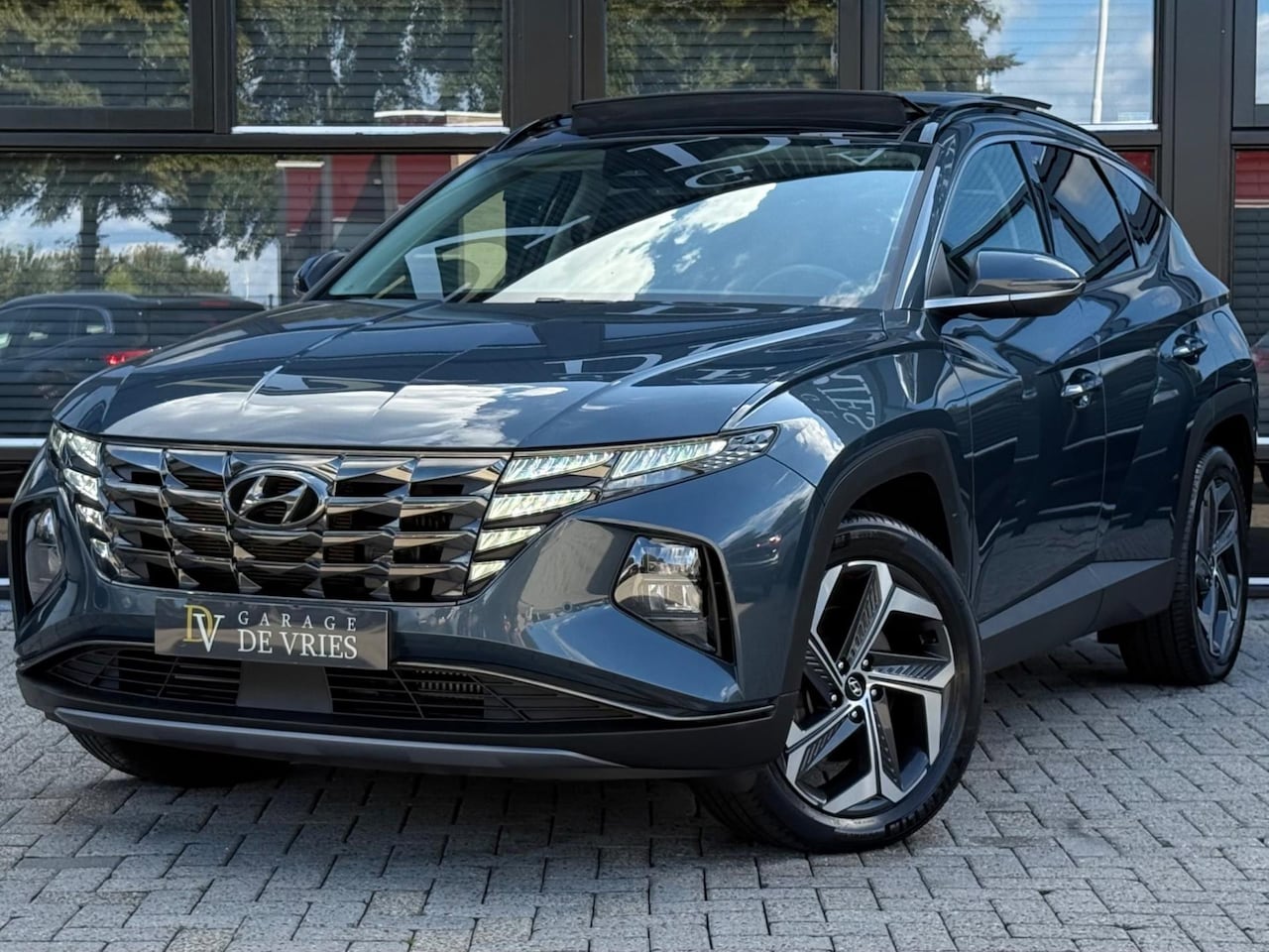 Hyundai Tucson - 1.6 T-GDI PHEV Premium Sky 4WD Panoramadak ACC Garantie - AutoWereld.nl