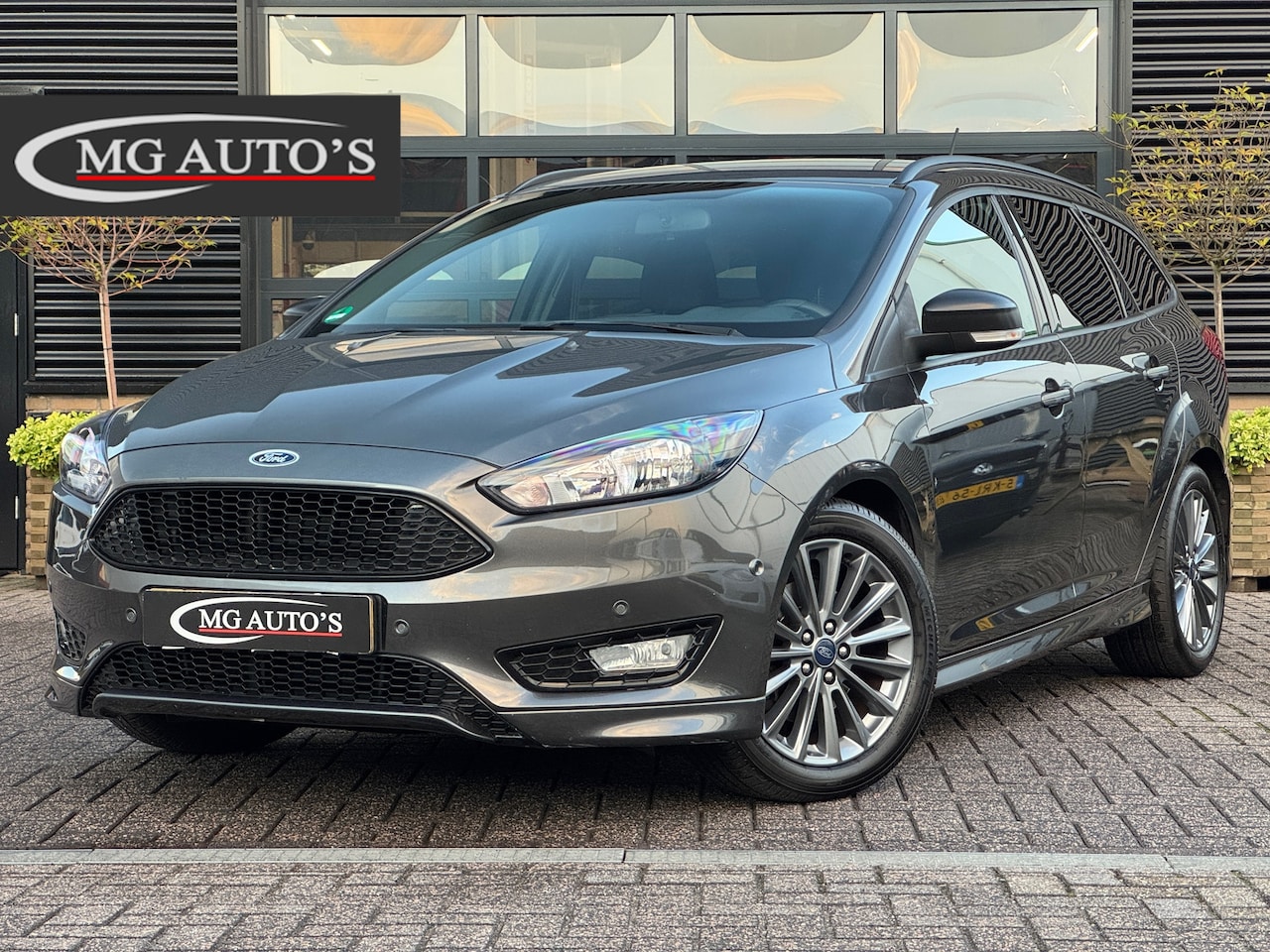 Ford Focus Wagon - 1.5 ST-Line | Trekhaak | Navigatie | Cruise Control | Apple CarPlay/Android Auto | Stoel/S - AutoWereld.nl
