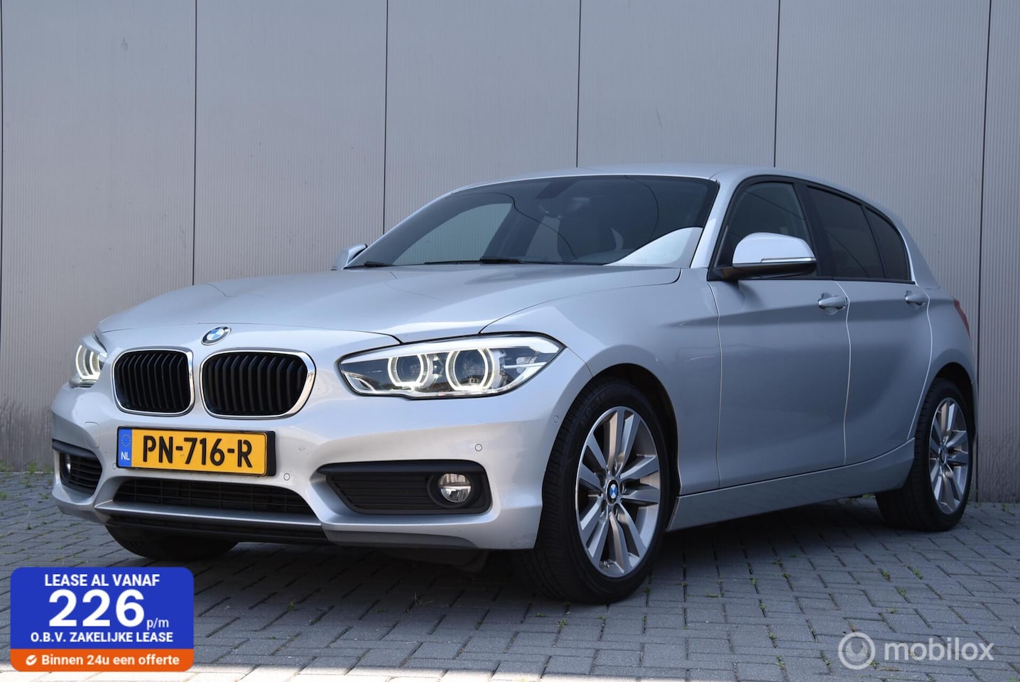 BMW 1-serie - 118i Corporate Lease Executive | Leer | Camera | Stoelverwarming | Clima | - AutoWereld.nl