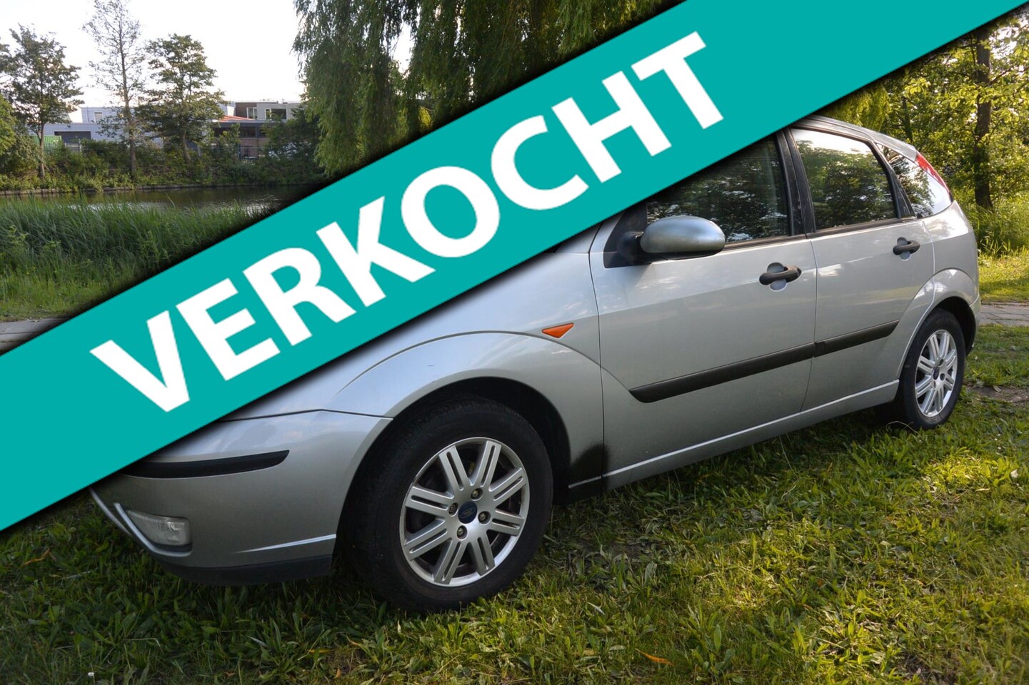 Ford Focus - 1.6-16V Futura*airco*leer*navi*2de eigenaar - AutoWereld.nl