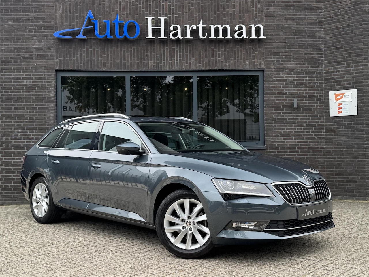 Skoda Superb Combi - 1.4 TSI ACT Ambition Business PANO | TREKHAAK | XENON | STOELVERWARMING - AutoWereld.nl