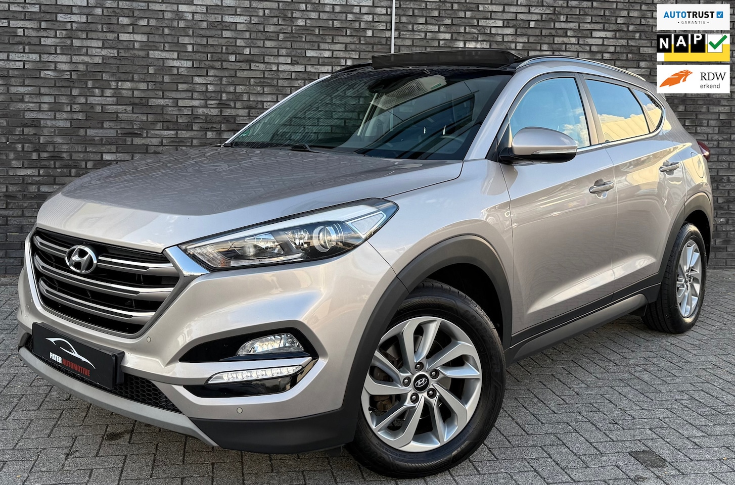 Hyundai Tucson - 1.6 T-GDi Premium 4WD Aut|Panorama|1600kg Trekgewicht|Camera|Leder|Topstaat - AutoWereld.nl