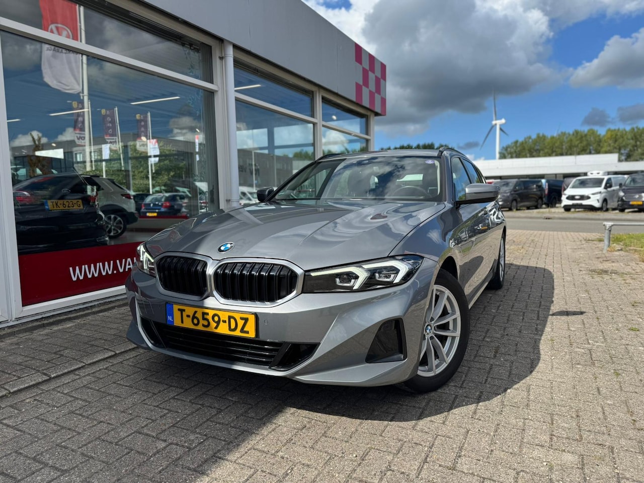 BMW 3-serie Touring - 2.0 curved screen 318i - AutoWereld.nl