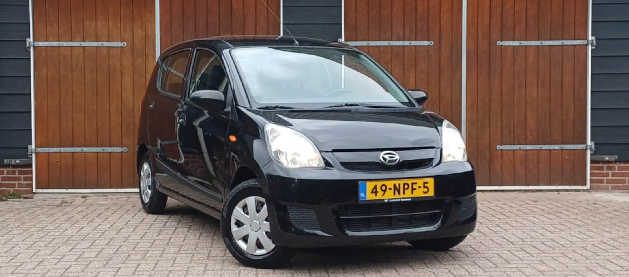 Daihatsu Cuore - 1.0 Comfort 1.0 Comfort, Airco, Trekhaak, 5 Deurs, NAP - AutoWereld.nl