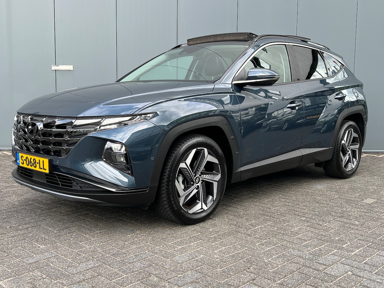 Hyundai Tucson - 1.6 T-GDI HEV 230pk Premium Sky | Leder | Carplay | Climate | Trekhaak | Navigatie | Elek. - AutoWereld.nl
