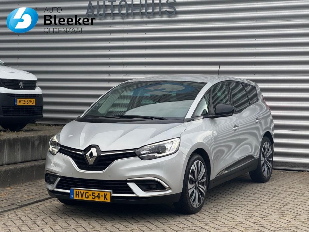 Renault Grand Scénic - 1.3TCE 140Pk Business Zen 7 pers. Airco Trekhaak Navi Cruise Lane PDC - AutoWereld.nl