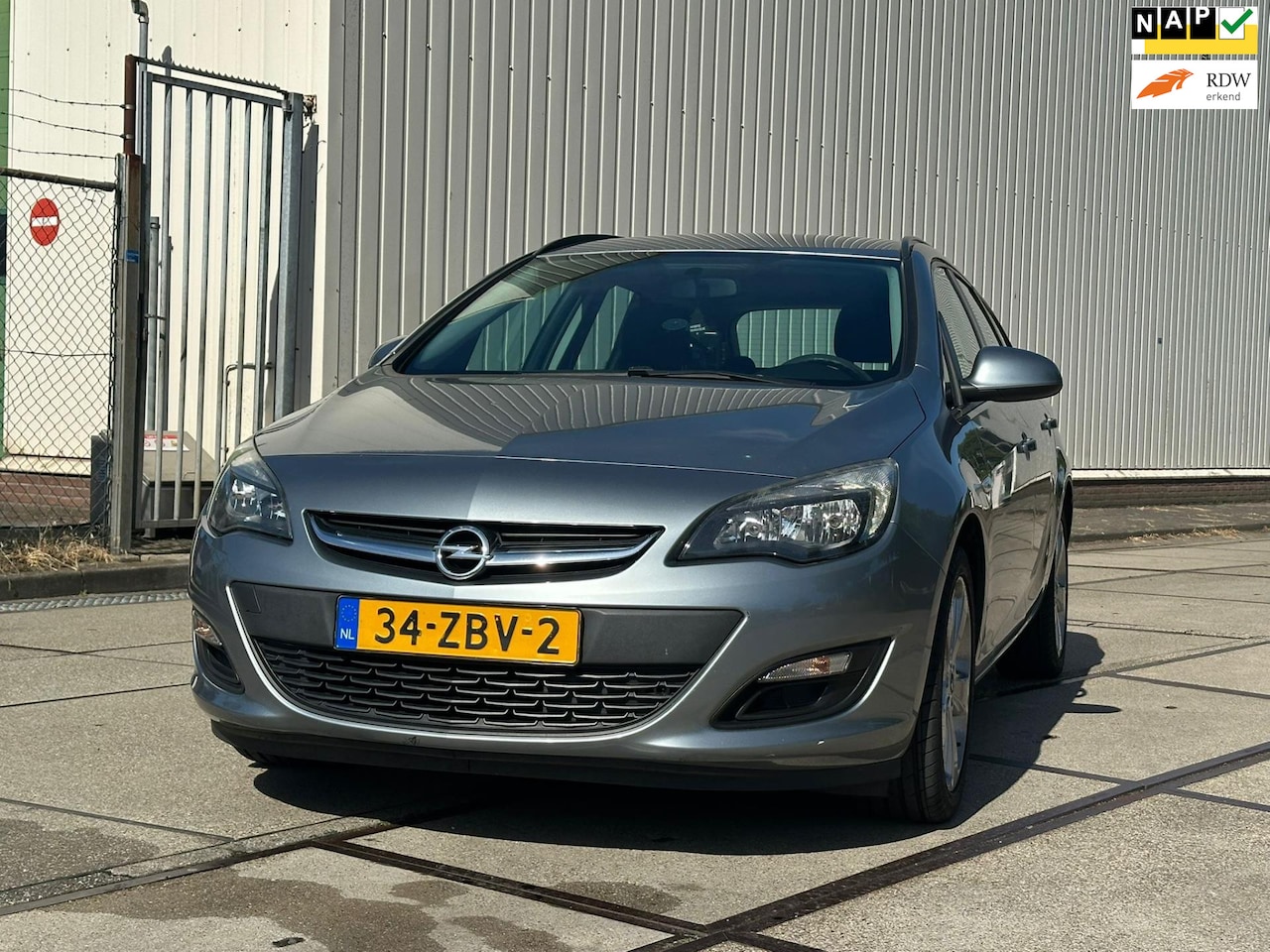 Opel Astra Sports Tourer - 1.4 Turbo Cosmo Airco/Navi/Cruise/Pdc - AutoWereld.nl