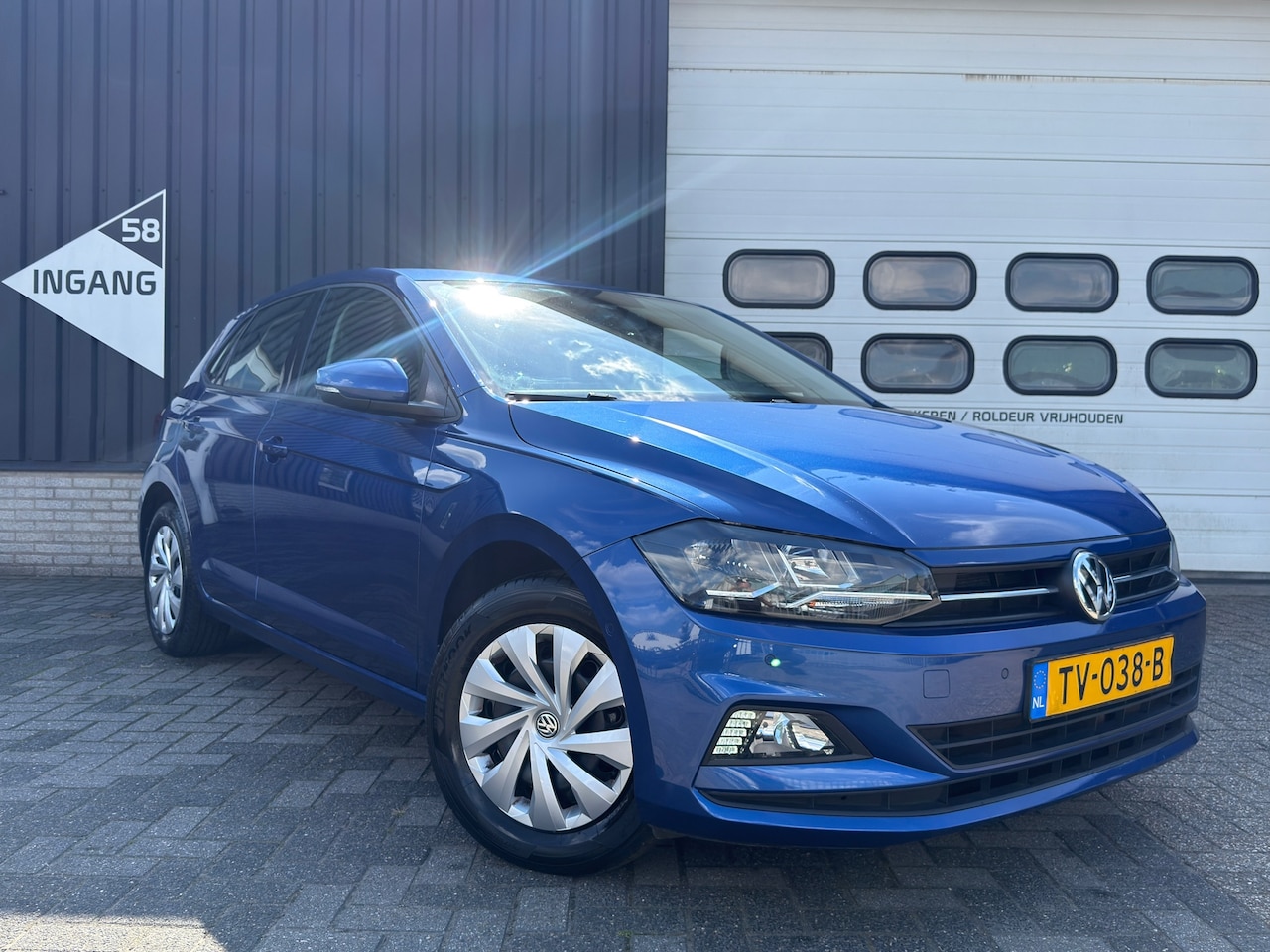 Volkswagen Polo - 1.0 TSI Comfortline/1eig./automaat/pdc/navi/airco/dab/carplay - AutoWereld.nl