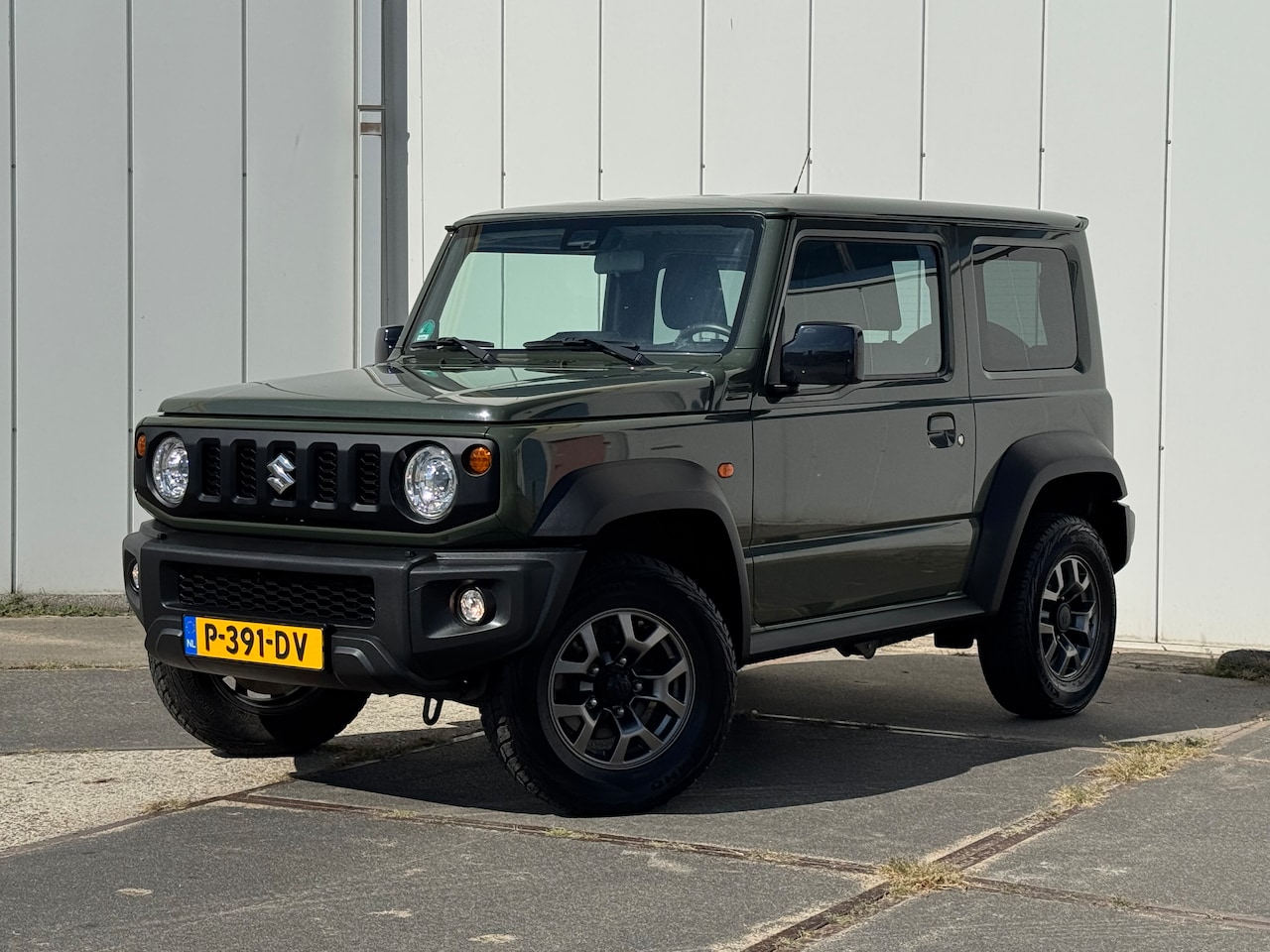 Suzuki Jimny - 1.5 Stijl AllGrip 4x4 / Clima / Cruise / LED - AutoWereld.nl