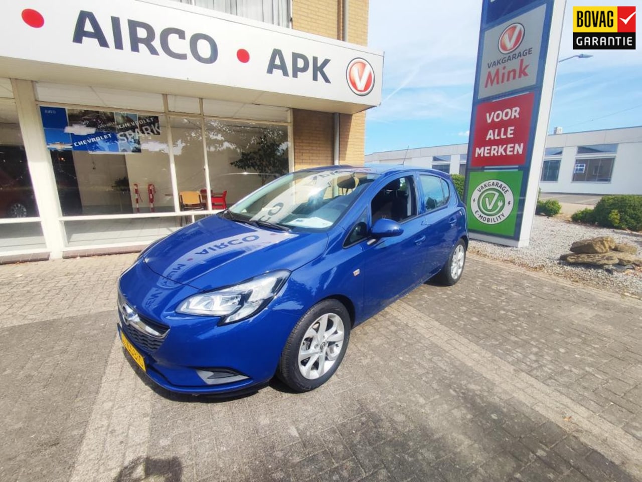 Opel Corsa - 1.4 Online Edition 5 drs. navigatie-airco-parkeersensoren - AutoWereld.nl