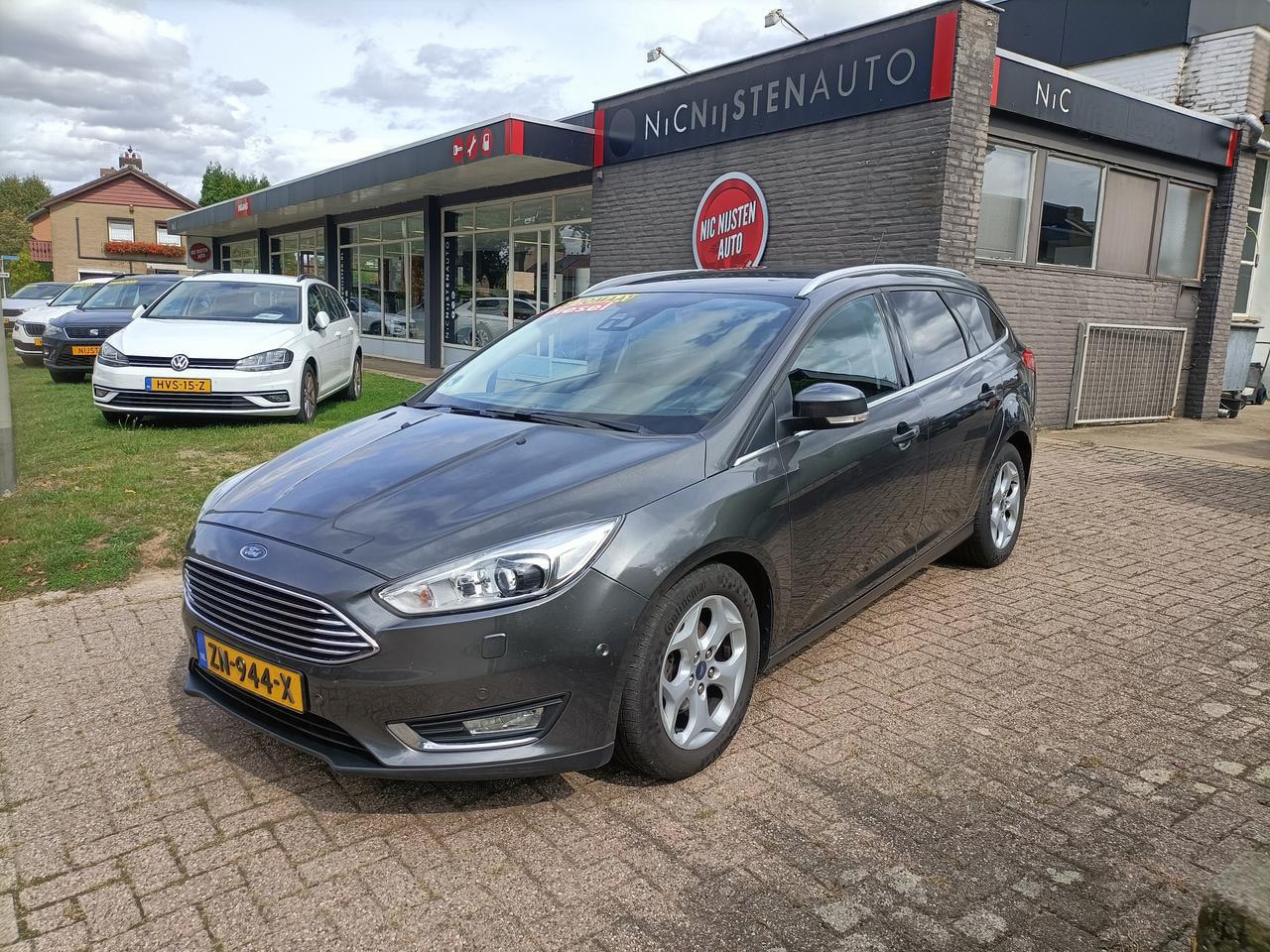 Ford Focus Wagon - 1.5 TDCI Titanium Automaat, Navi, Cruise - AutoWereld.nl