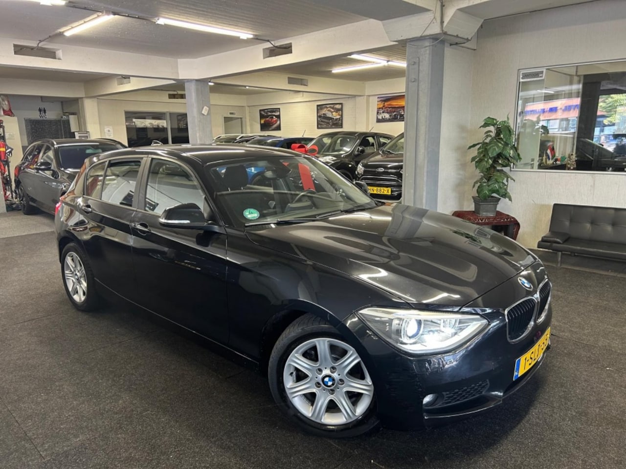 BMW 1-serie - 116i EDE Executive*Xenon*Navi*NAP*Velgen - AutoWereld.nl