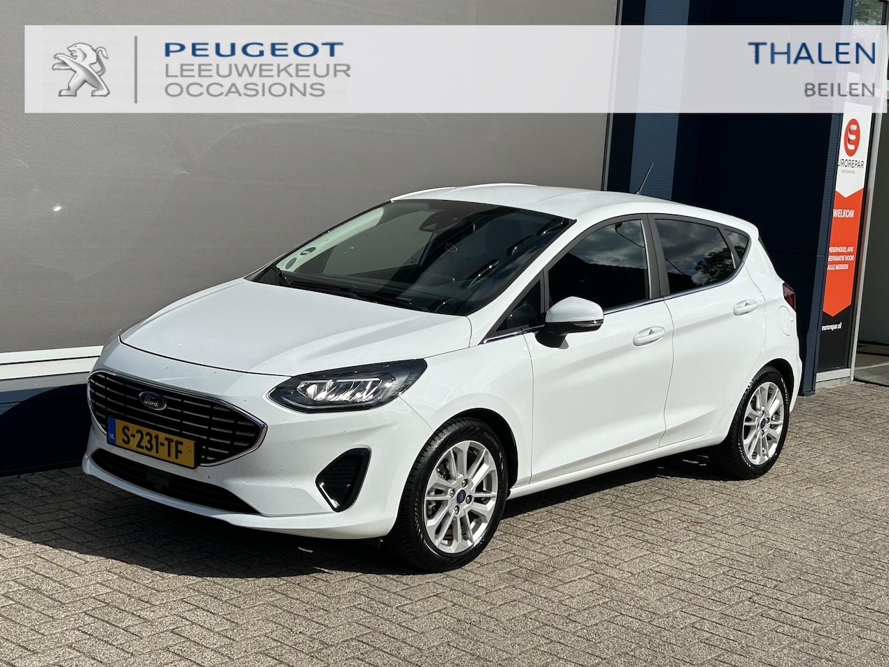 Ford Fiesta - 1.0 EcoBoost Hybrid Titanium | Lage Km stand 25000 | Trekhaak | All Season banden | Climat - AutoWereld.nl