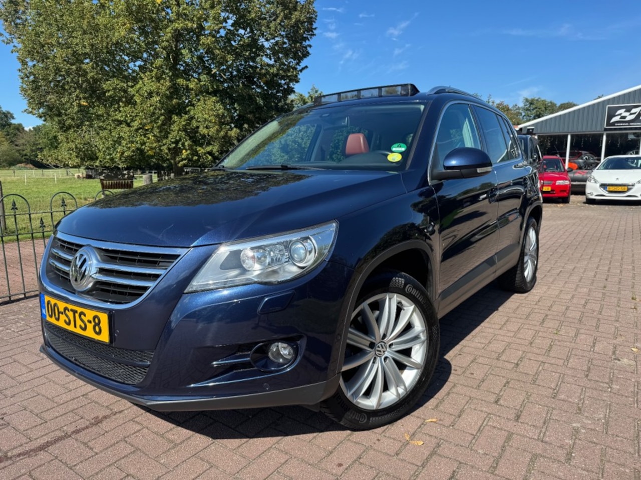 Volkswagen Tiguan - 4Motion DSG 2,0 TDI Pano, Trekhaak, VOL!! - AutoWereld.nl