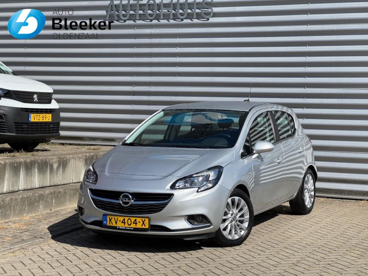 Opel Corsa - 1.4 Innovation Airco Trekhaak Carplay Navi Cruise - AutoWereld.nl