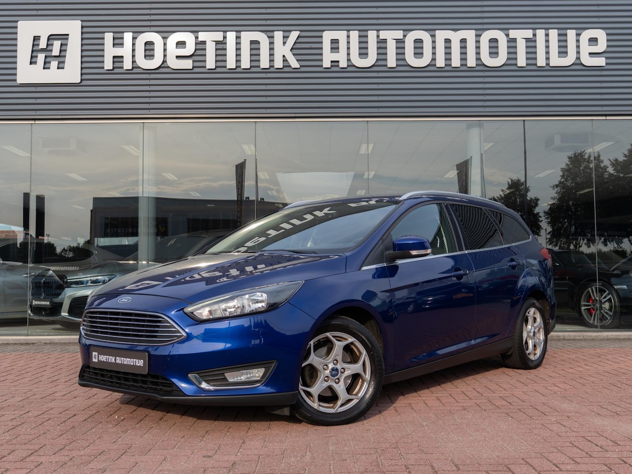 Ford Focus Wagon - 1.0 Titanium | Ambiente | Navi | Cruise - AutoWereld.nl