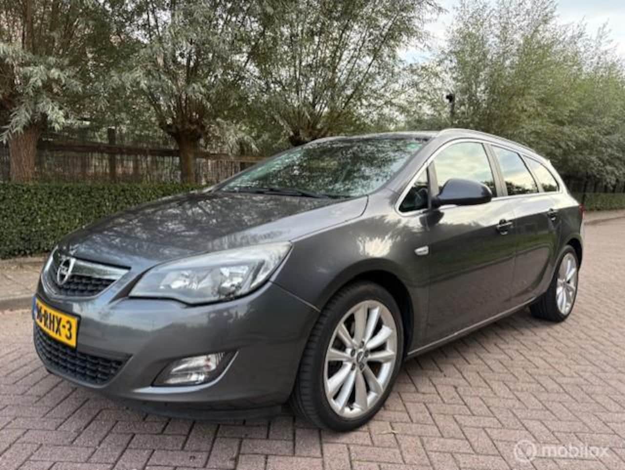 Opel Astra Sports Tourer - 1.4 Turbo Sport 1.4 Turbo Sport - AutoWereld.nl
