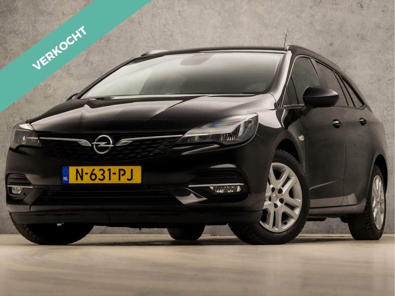 Opel Astra Sports Tourer - 1.4 Business Sport 146Pk Automaat (APPLE CARPLAY, NAVIGATIE, CRUISE, GETINT GLAS, SPORTSTO - AutoWereld.nl