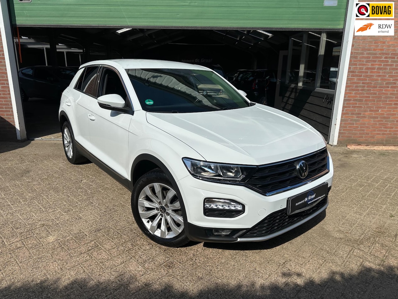 Volkswagen T-Roc - 1.5 TSI Sport|150PK/TRHK/NAVI/PDC/CAMERA/LANE-ASST - AutoWereld.nl