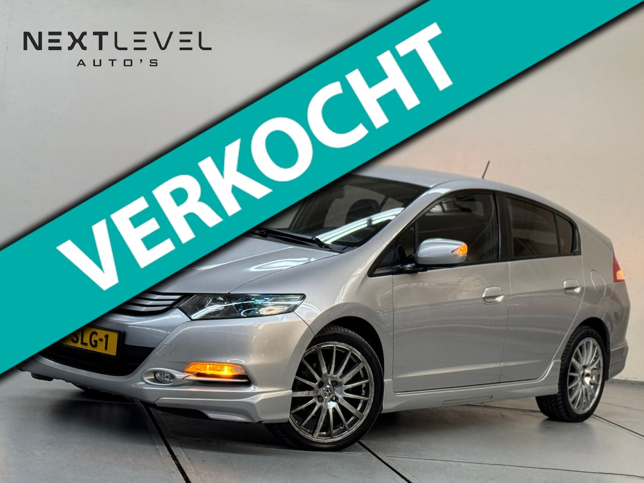 Honda Insight - 1.3 Elegance Sport AUT Cruise Stoelverwarming - AutoWereld.nl