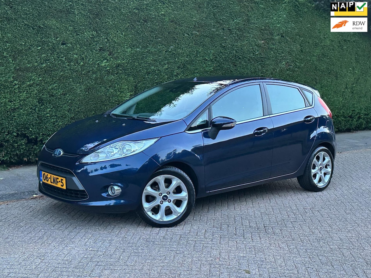 Ford Fiesta - 1.25 Titanium /AIRCO/PDC/CRUISE/VELGEN/RIJDTSUPER/ - AutoWereld.nl