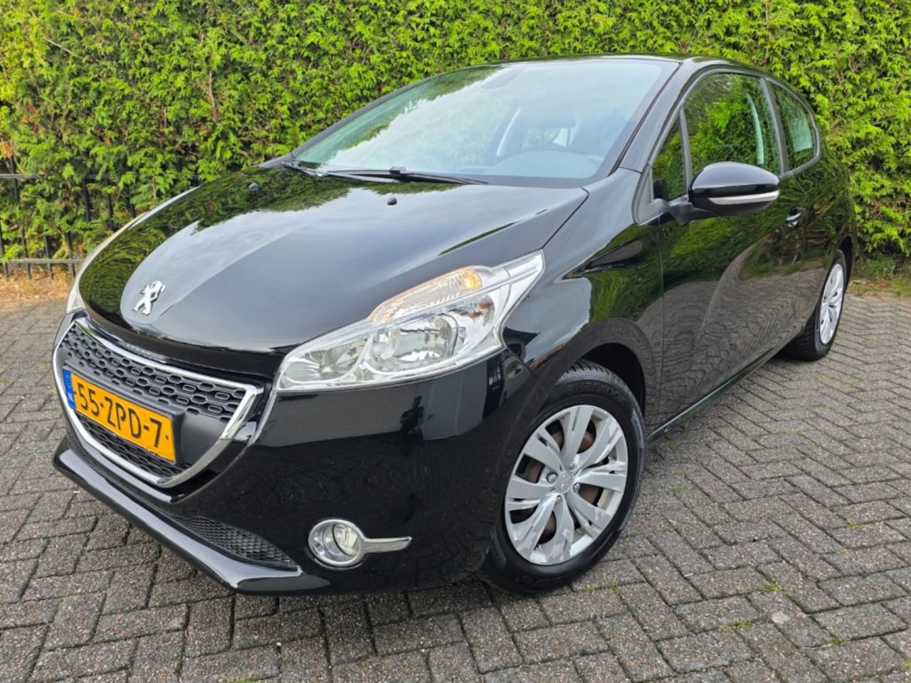 Peugeot 208 - 1.2 VTi Envy airco navi parkeers. - AutoWereld.nl