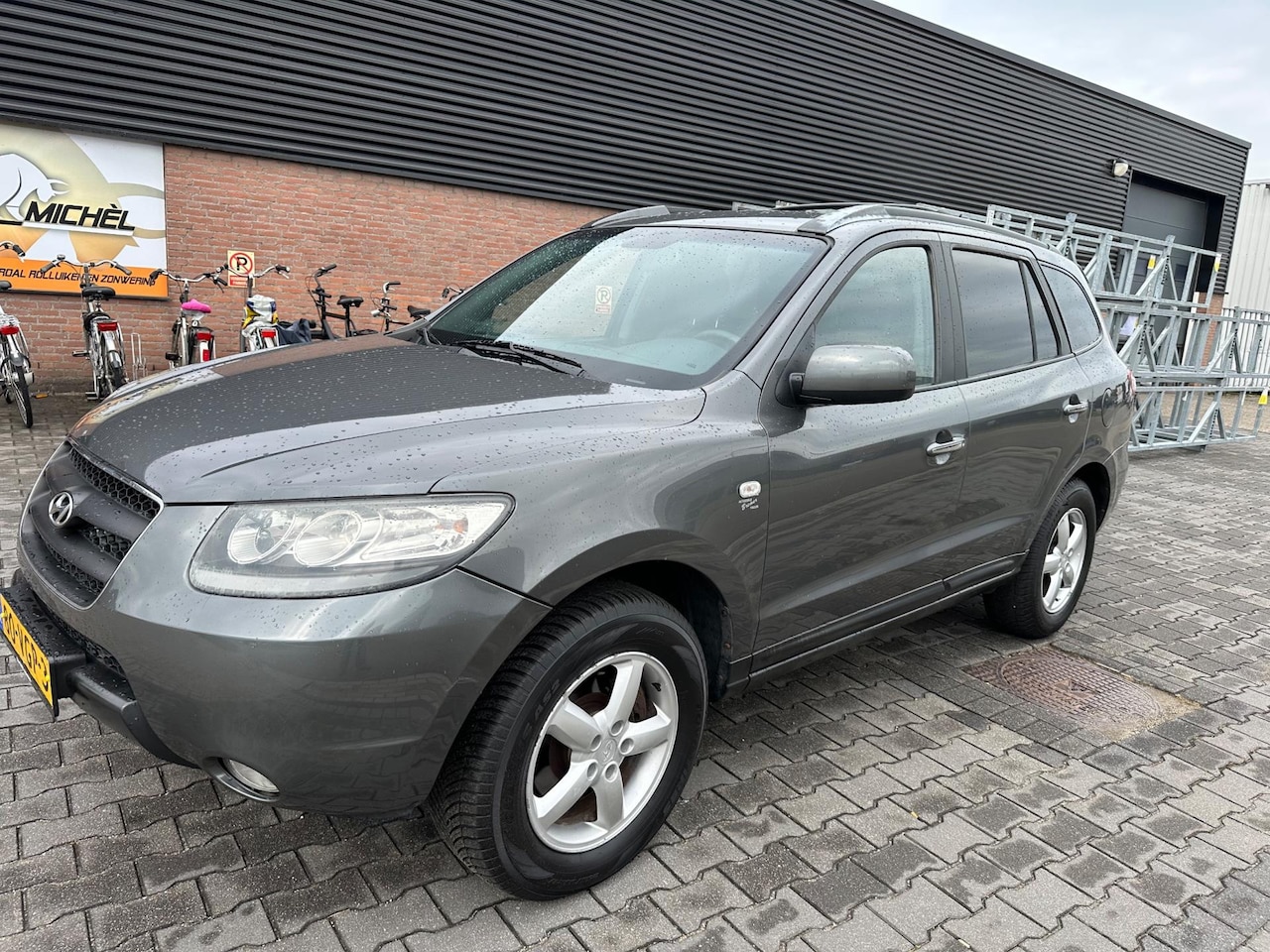 Hyundai Santa Fe - 2.2 CRDi VGT StyleVersion grijs kenteken - AutoWereld.nl