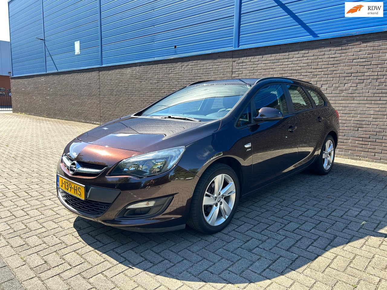 Opel Astra Sports Tourer - 1.4 Turbo Sport | Stoel-Stuur Verwarming | Climate | Cruise | Trekhaak | Navi | 17” LM Vel - AutoWereld.nl