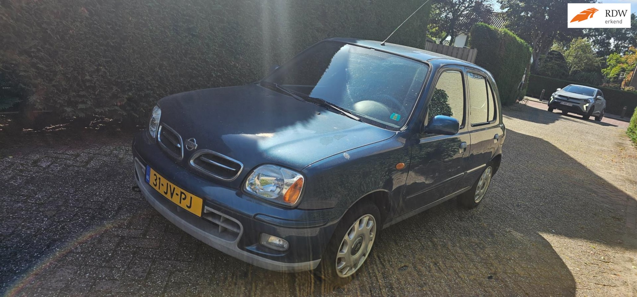 Nissan Micra - 1.4 Clair CVT automaat 48.dznd km nap - AutoWereld.nl