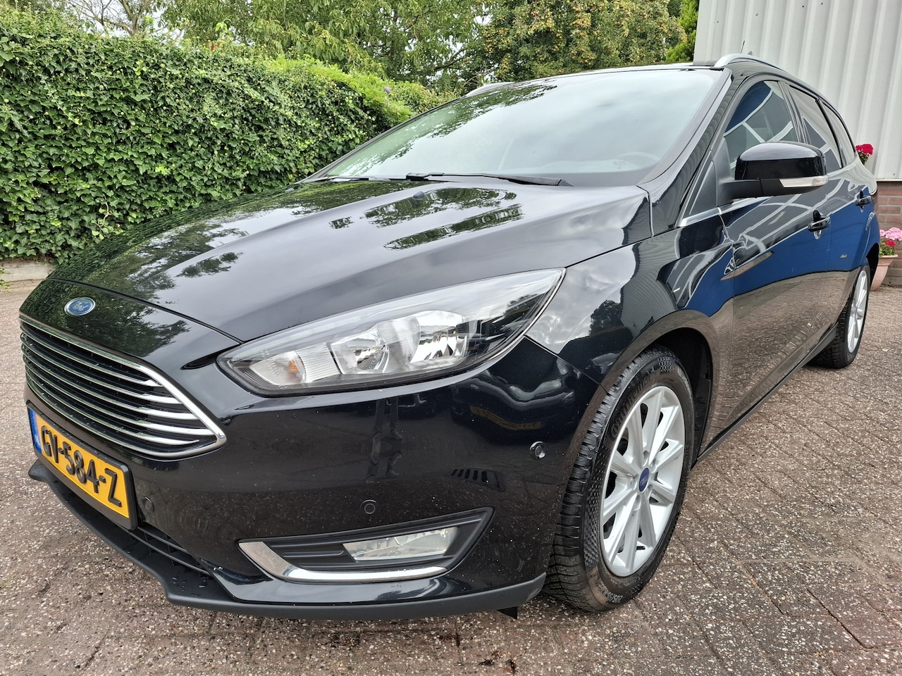 Ford Focus Wagon - 1.0 First Edition CLIMAT/CRUISE/NAVI/PDC 125PK - AutoWereld.nl