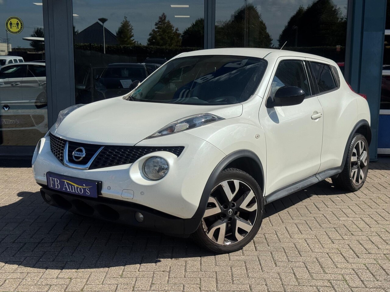 Nissan Juke - 1.6 Connect Edition Airco Cruise Navi - AutoWereld.nl