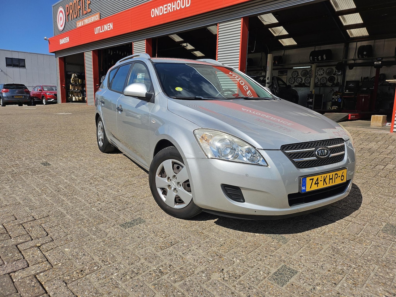 Kia Cee'd Sporty Wagon - 1.4 X-tra 1.4 X-tra - AutoWereld.nl