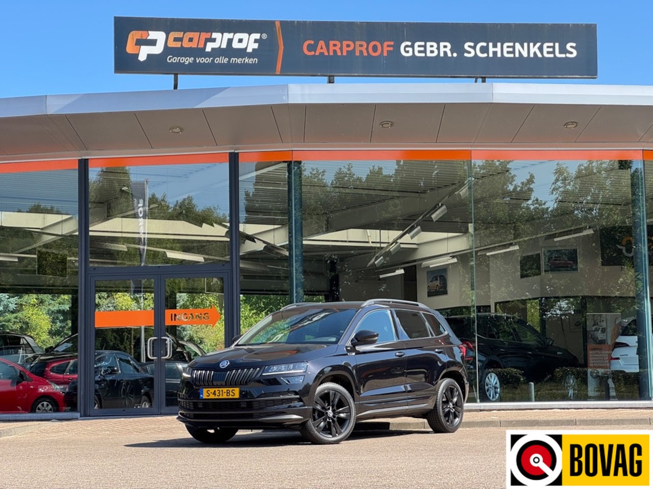 Skoda Karoq - 1.5 TSI ACT DSG Sportline Business | Stuurwielverwarming en stoelverwarming | Sportstoelen - AutoWereld.nl