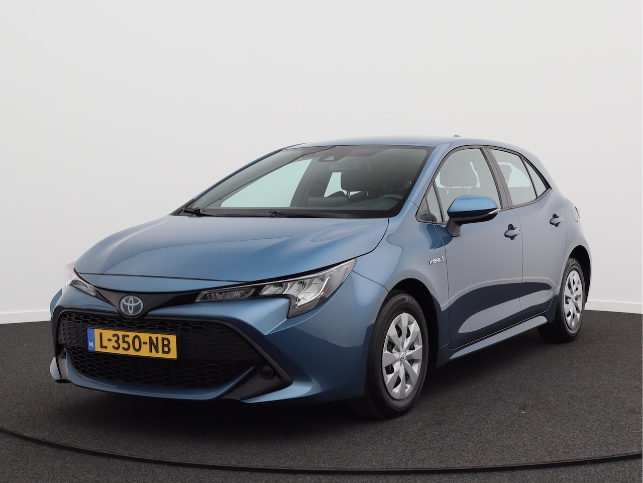 Toyota Corolla - 1.8 Hybrid Comfort/ unieke km/ zeer mooi! - AutoWereld.nl