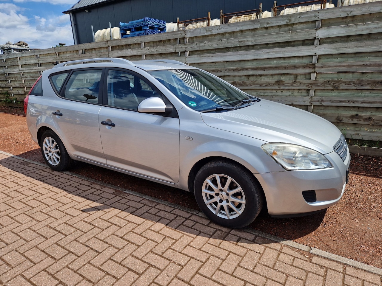 Kia Cee'd Sporty Wagon - 1.4 CVVT X-tra Airco - AutoWereld.nl