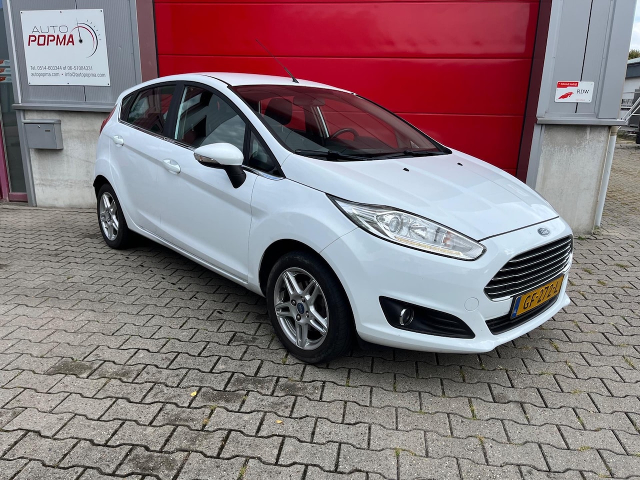 Ford Fiesta - 1.0 80pk Titanium / Airco / LM velgen / 5 deurs / Navigatie / Dagrij LED / Origineel NL au - AutoWereld.nl
