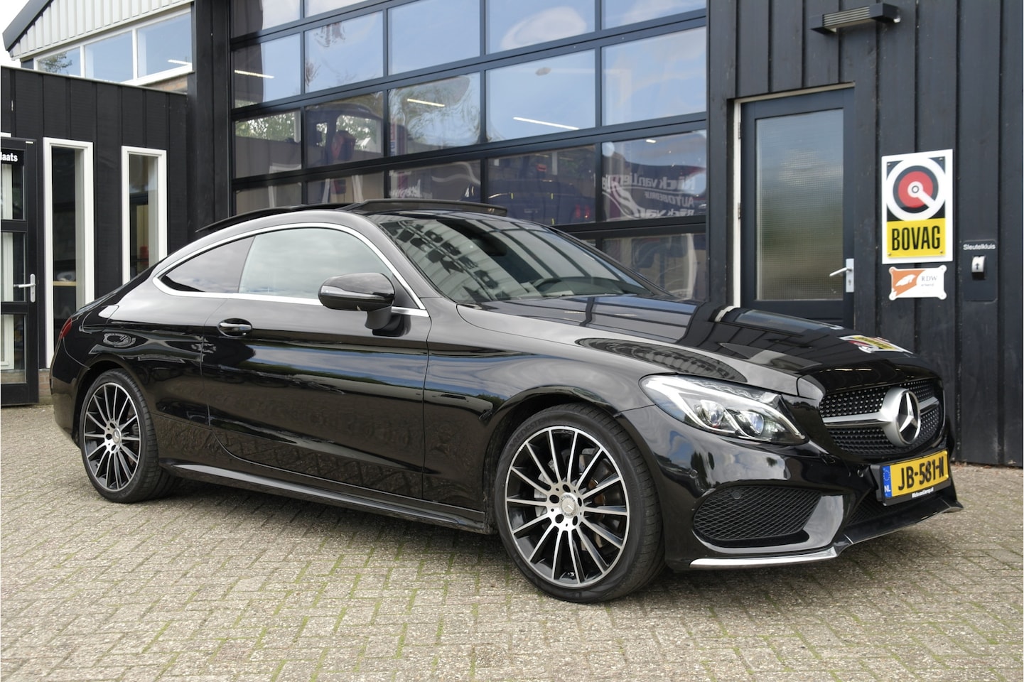 Mercedes-Benz C-klasse Coupé - 180 Ambition Automaat AMG-Pakket | NL-Auto | Pano | Cruise | Camera | Half-Leder - AutoWereld.nl