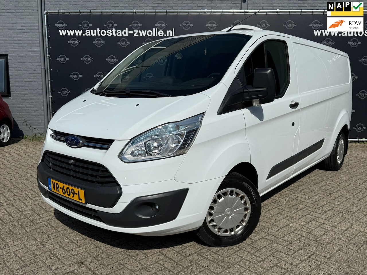 Ford Transit Custom - 310 2.2 TDCI L2H1 Trend Euro 6 Airco/cruise/Nap/cruise/3Zits/Trekhaak - AutoWereld.nl