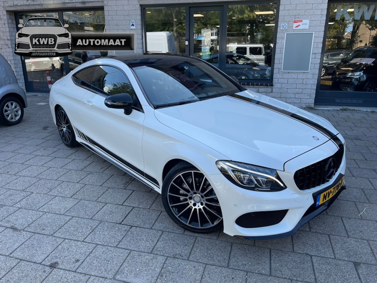 Mercedes-Benz C-klasse Coupé - 200 Amg Bruin Leer Pano Burmester - AutoWereld.nl
