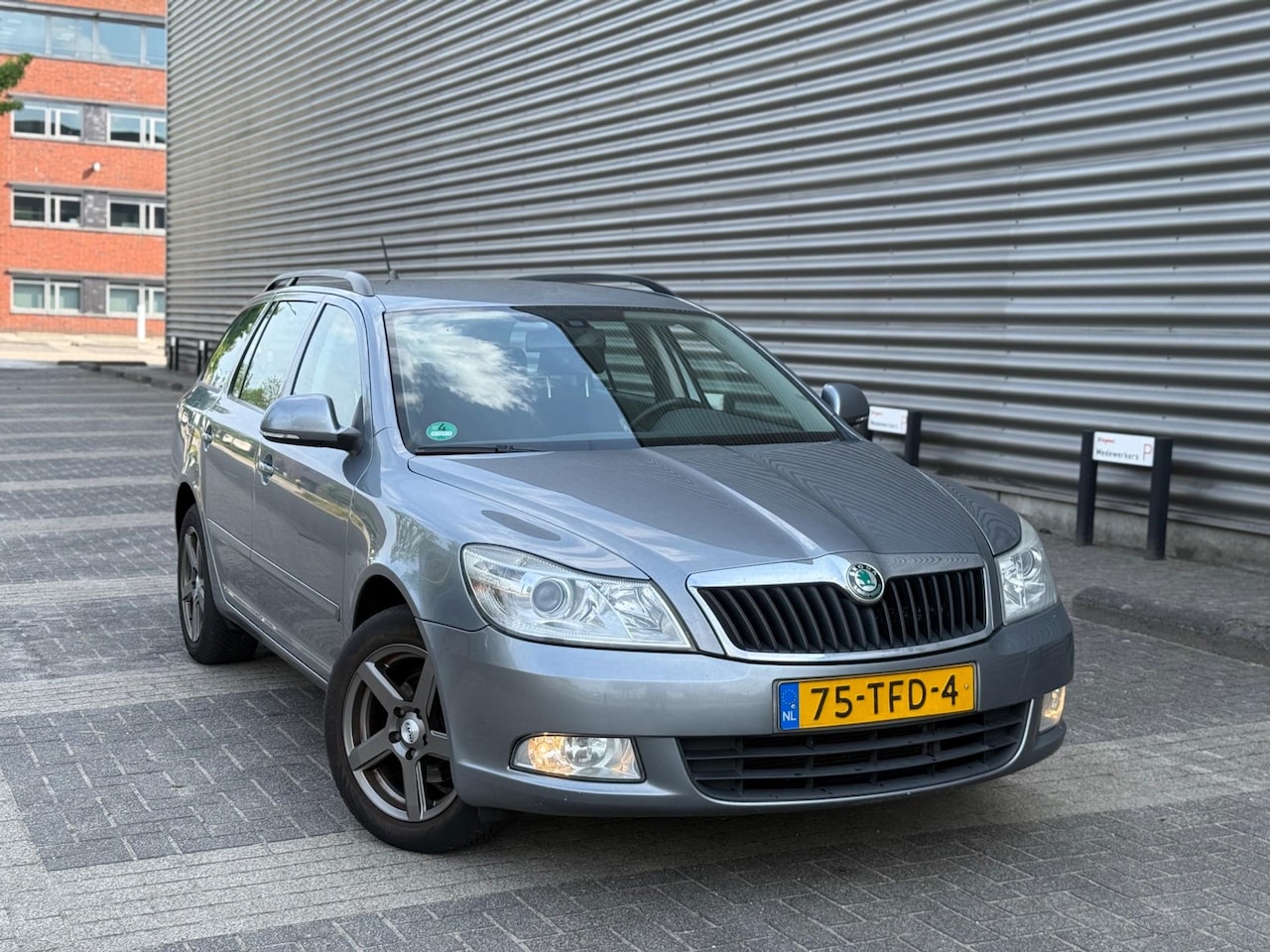 Skoda Octavia Combi - 1.2 TSI Business (bj 2012) NAVI|CLIMA|LMV|APK:05-2026 - AutoWereld.nl