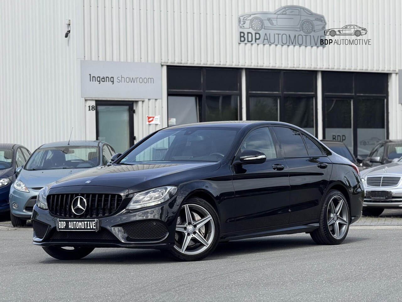 Mercedes-Benz C-klasse - 200 Prestige AMG/18'' LM/BURMESTER/LEER/STOELVERWARMING/AUTOMAAT - AutoWereld.nl