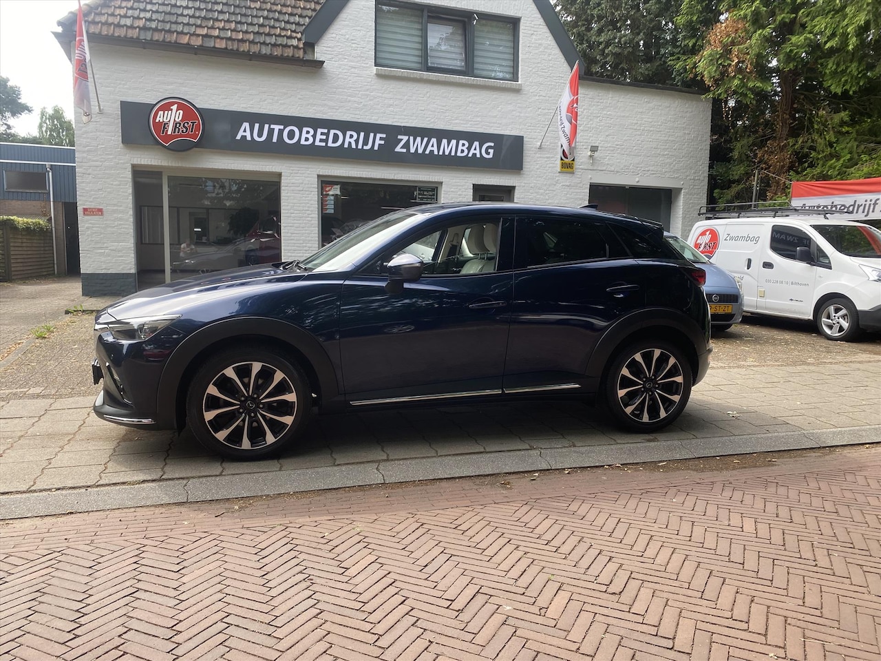 Mazda CX-3 - 2.0 SKYACTIV-G 120pk AUT GT-M white leader edition. - AutoWereld.nl