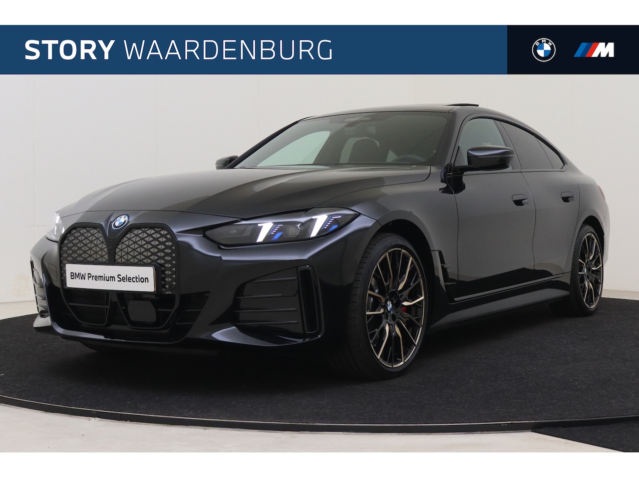 BMW i4 - eDrive40 M Sport / Schuif-kanteldak / M Sportstoelen / Adaptieve LED / Parking Assistant P - AutoWereld.nl