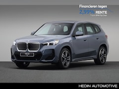 BMW iX1 - eDrive20 67 kWh | M-Sportpakket | Panoramadak | 19'' M-Lichtmetaalvelgen | Adaptief M-Onde